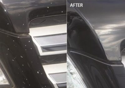 Paint touch-up on black car
